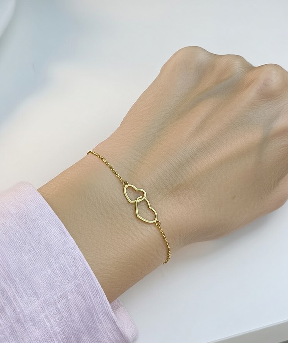 Verguld zilveren armband met twee hartjes